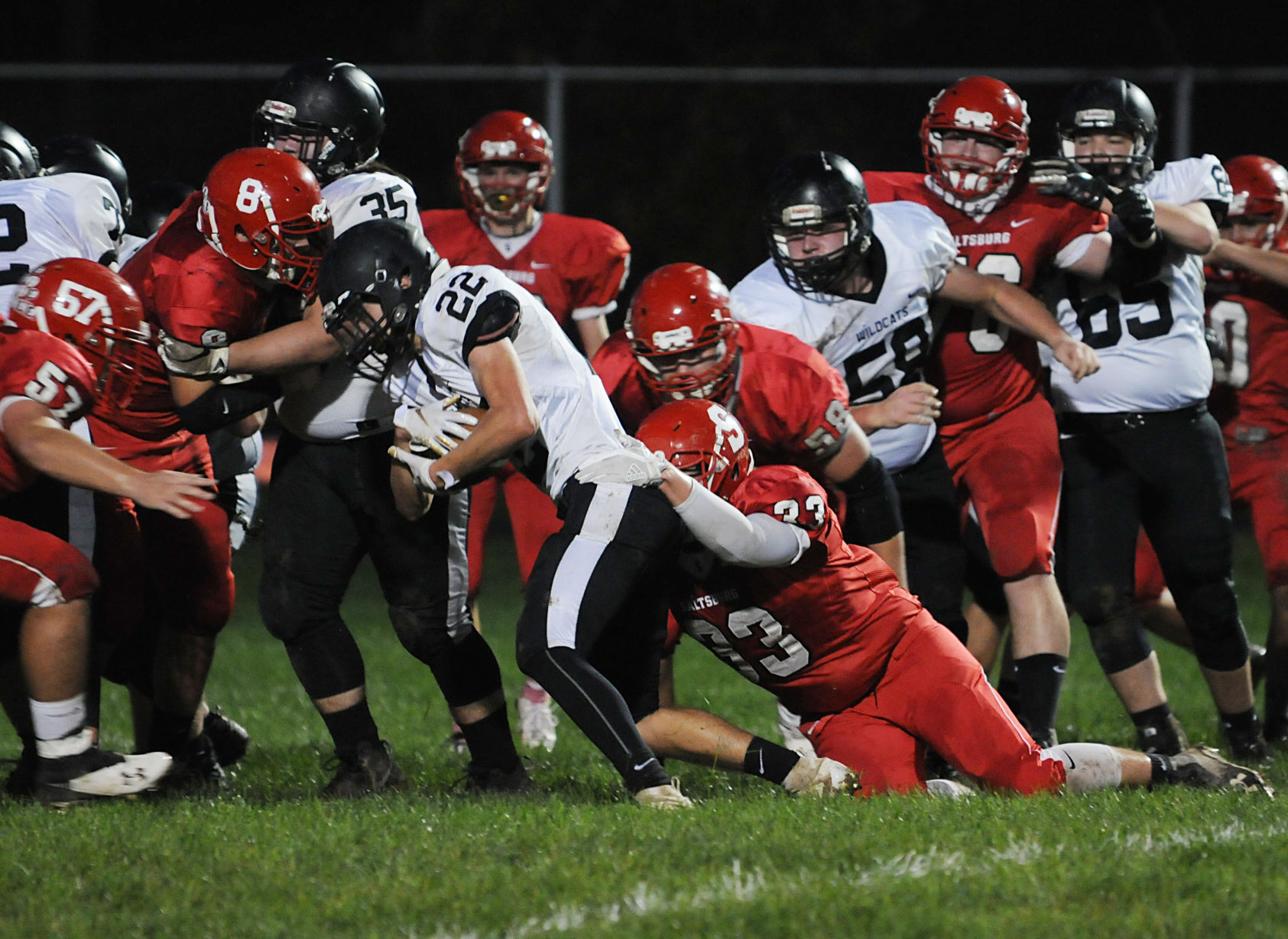 Gazette Photo Gallery: Wildcats thump Trojans in conference match